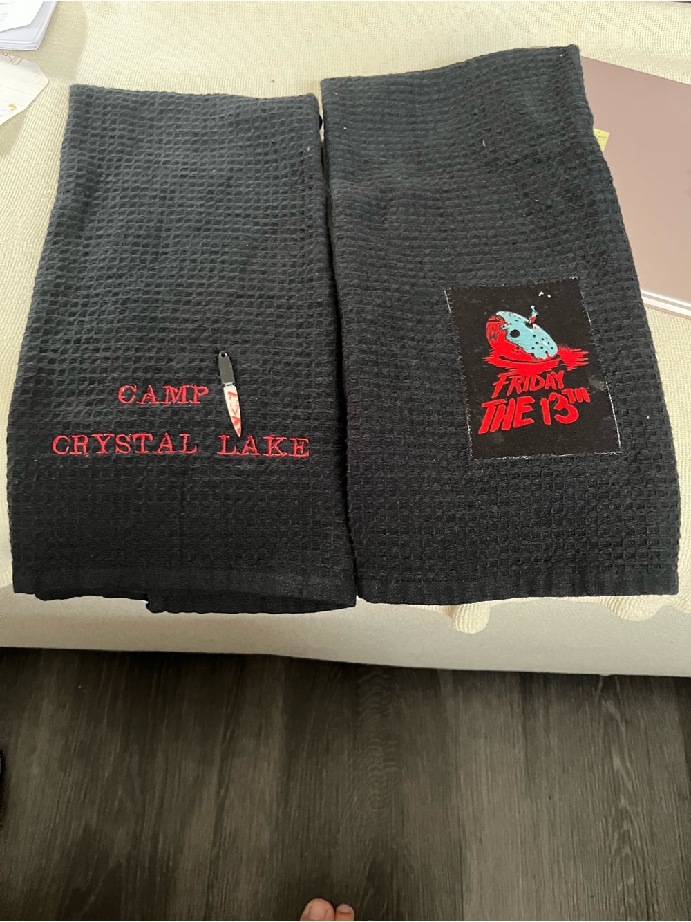 Black kitchen towels – Camp Crystal embroidery, knife charm and Jason applique.